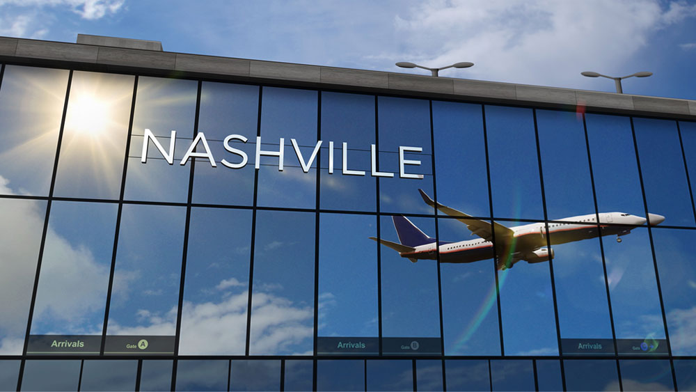 Nashville International Airport - Reflection of Airplane on Building - Latitude Longitude - Nashville Travel Tips